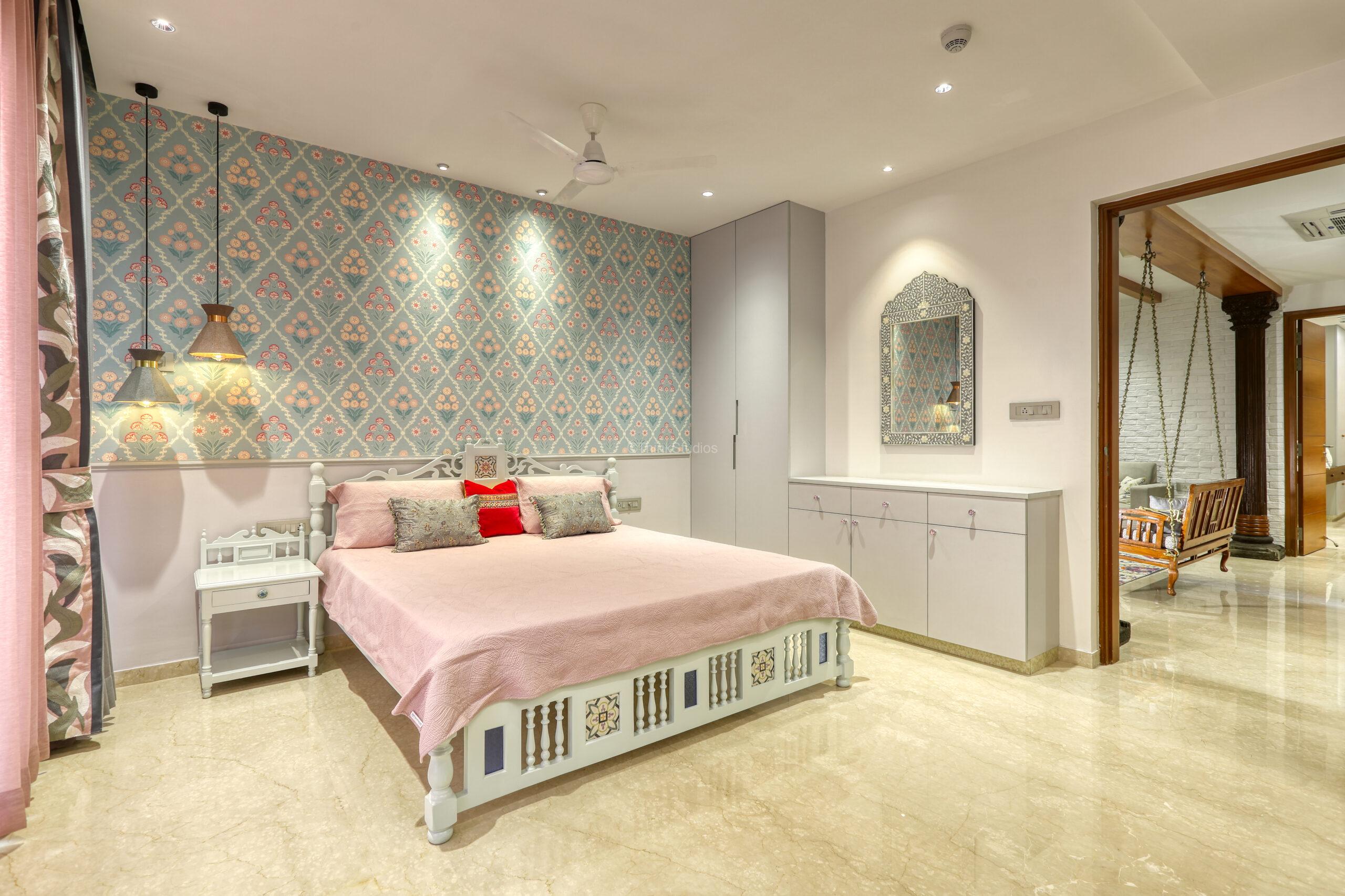 Pastel shades dominate this bedroom, while tradition peeks from the bed floor and headboards.