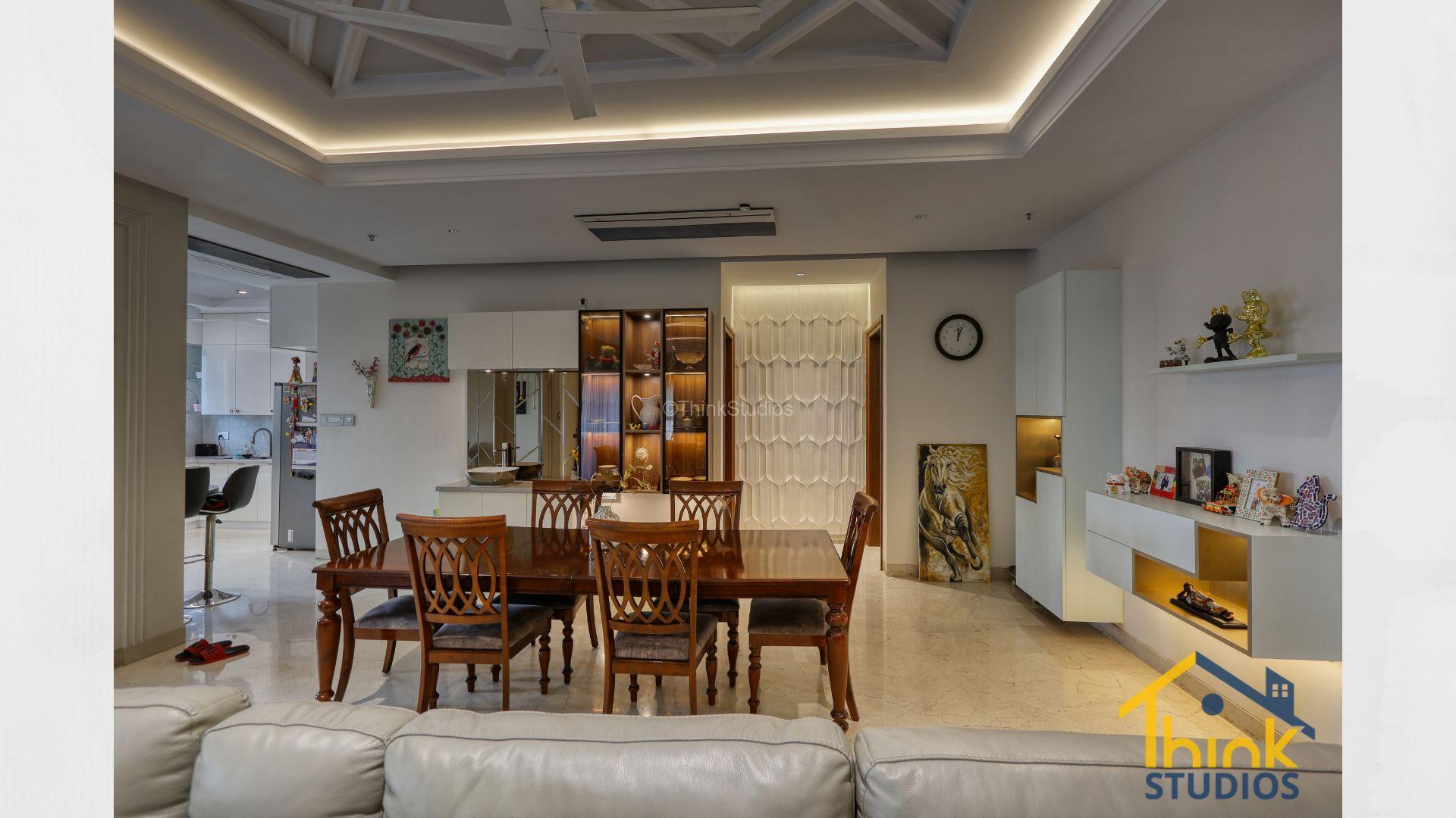 Functional Dining area with art and showcase crockery unit.